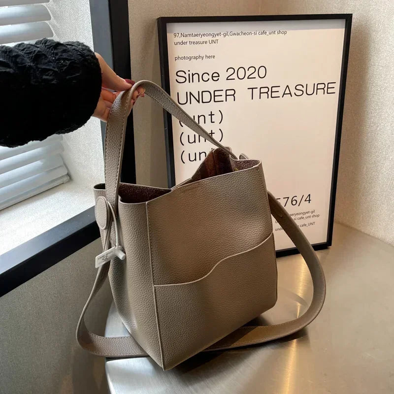 Trendsetter Leather Bucket Crossbody Bag