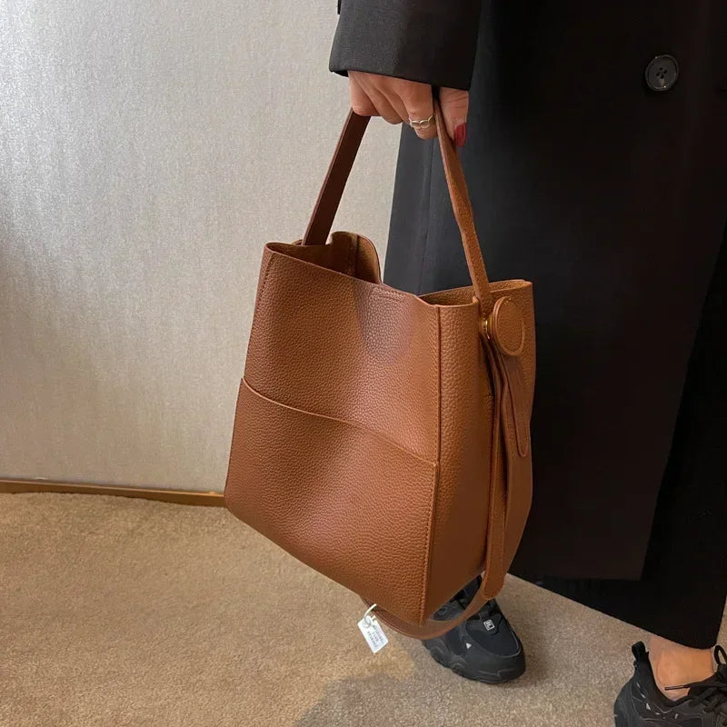 Trendsetter Leather Bucket Crossbody Bag